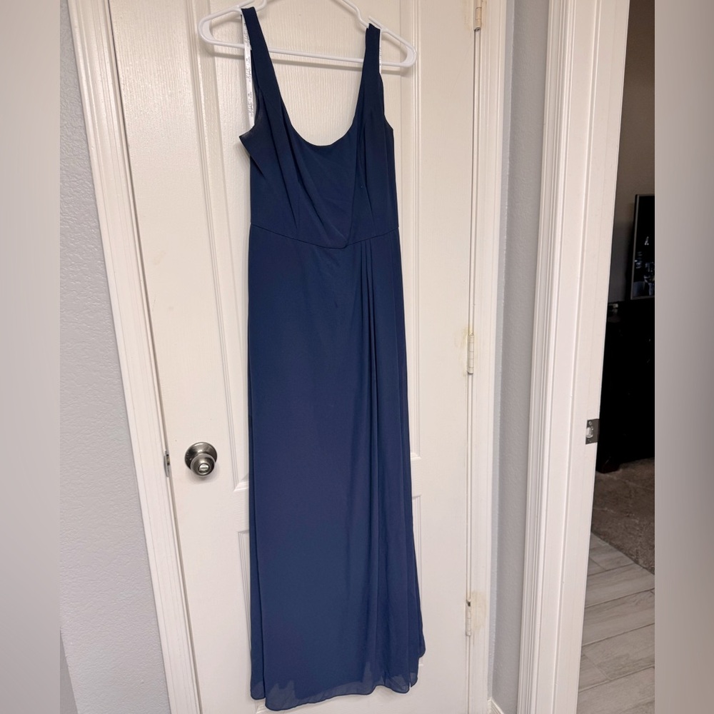 Dark blue wedding dress. Flowy with big bow on back
